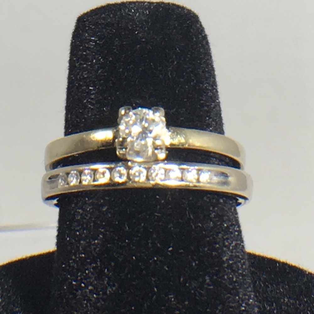 EUC  1/4 C. Diamond Solitaire & .10 C. Band Set
